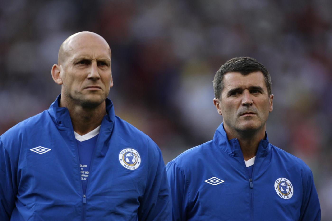 Jaap Stam and Roy Keane looking miserable